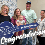 Hayley Vezza and clients celebrate closing with Professional Title Agency key.