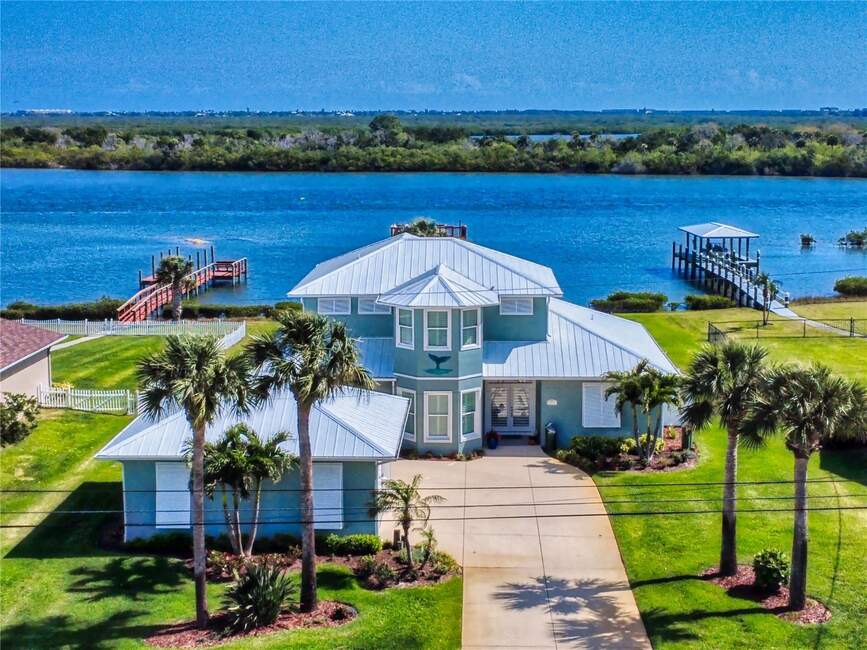 Aerial view of waterfront home at 2019 S Riverside Drive, Edgewater, FL