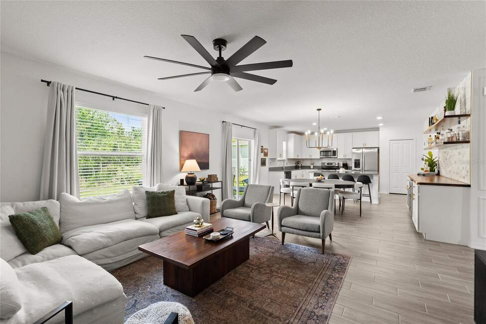 Spacious living room and kitchen at 2516 Hoptree Ln, Edgewater, FL